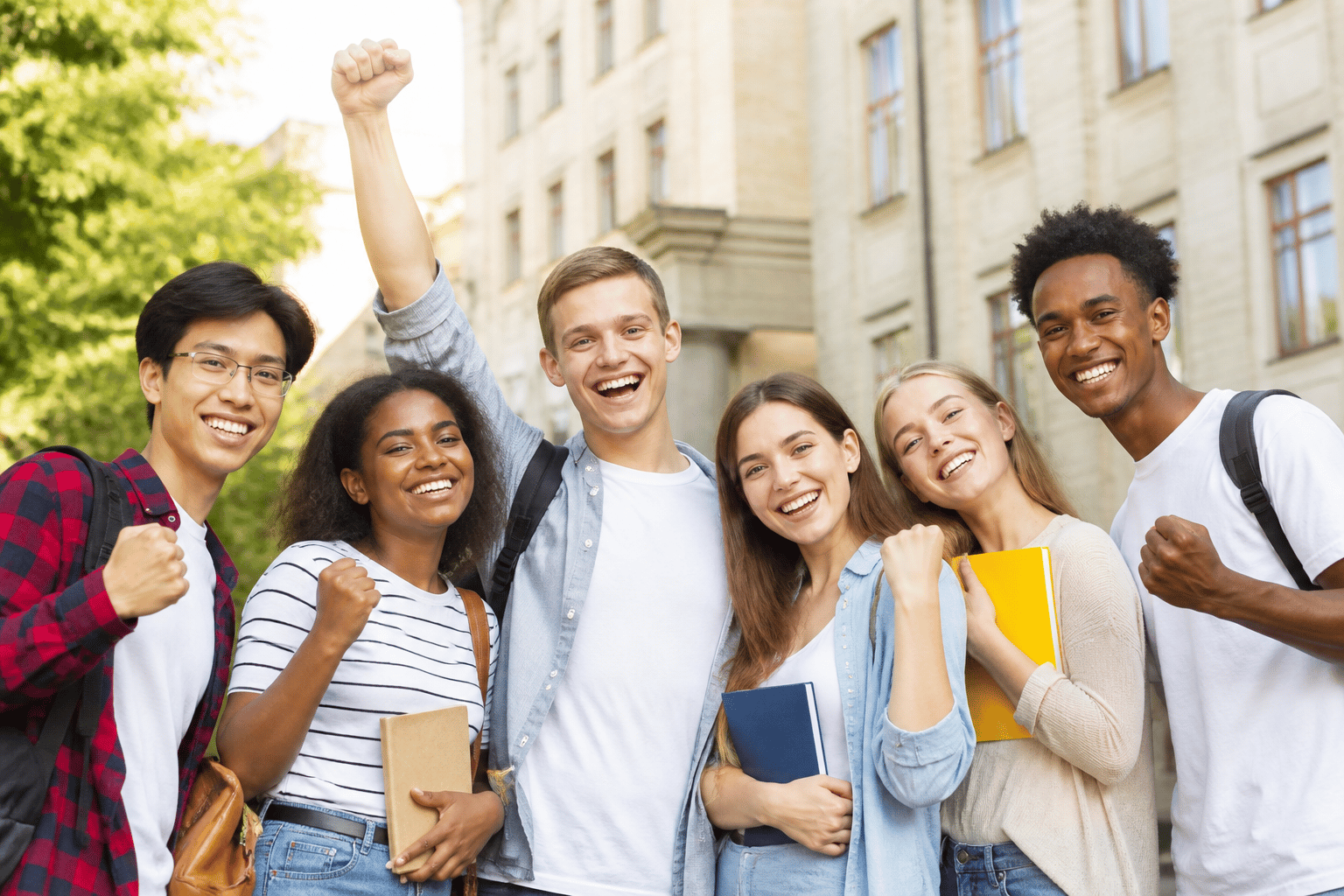 Students celebrating an institutional milestone — illustrative